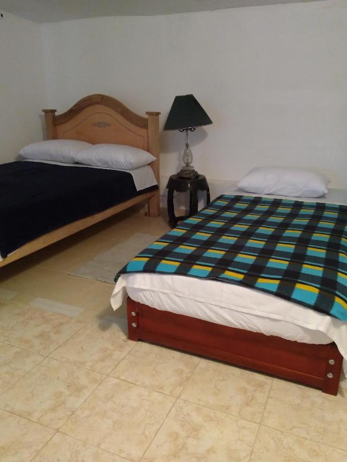 Hostal Naty Luna Jardín Esterno foto